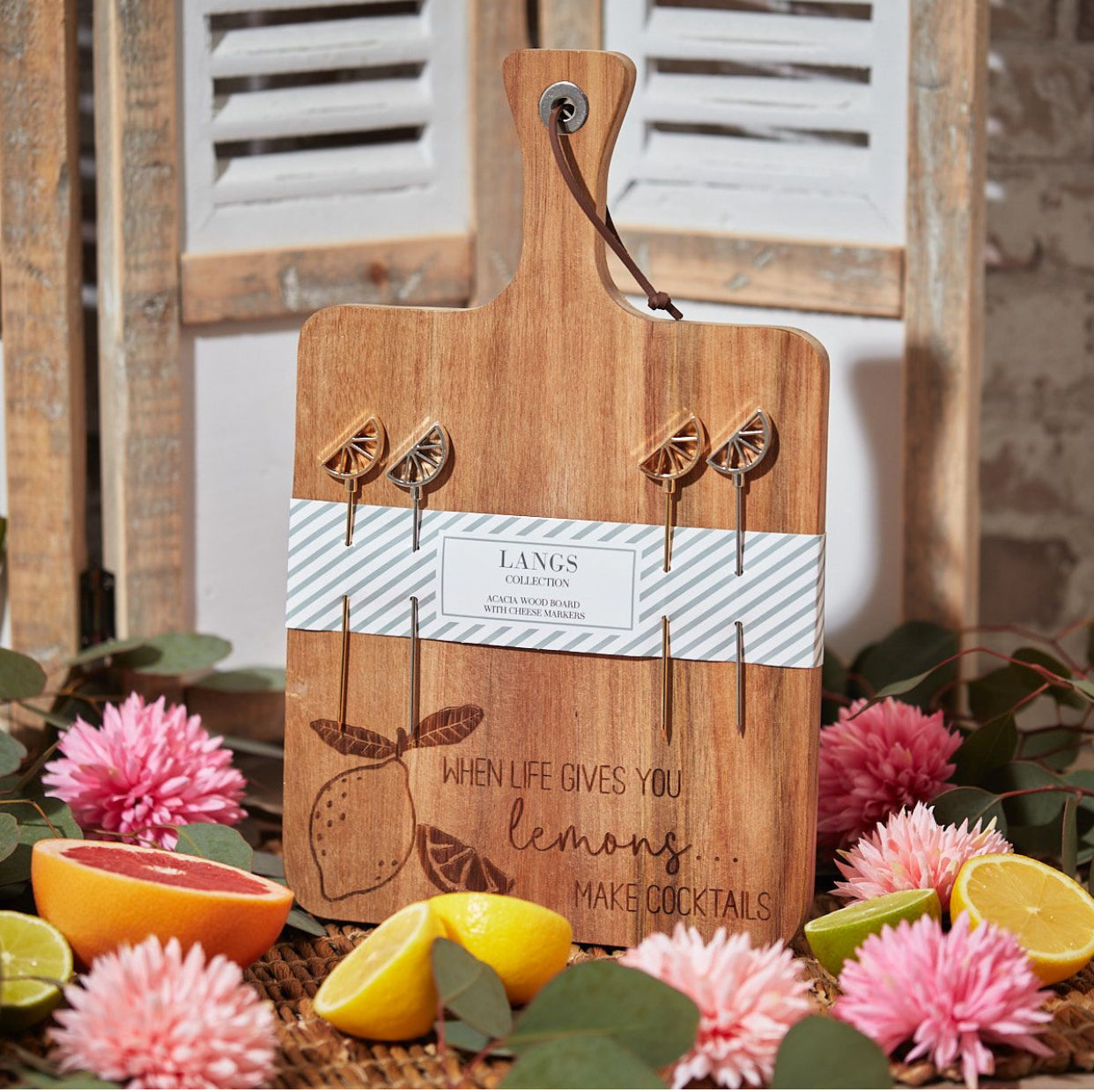 Gorgeous engraved acacia chopping board with lemon picks ‘when life gives you lemons make cocktails'
